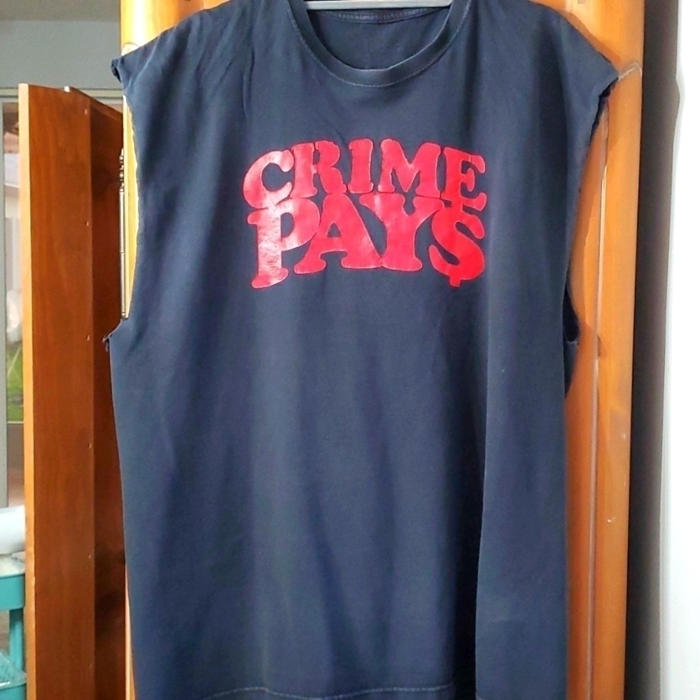 Crime pays black tee‎ shirt. Size large. RED letters. Cut off raw sleeves.
